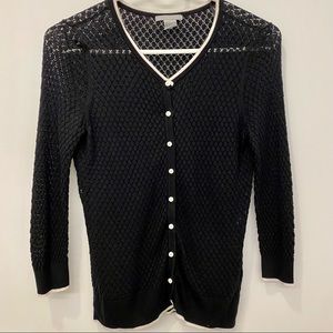 Black knit cardigan with white piping